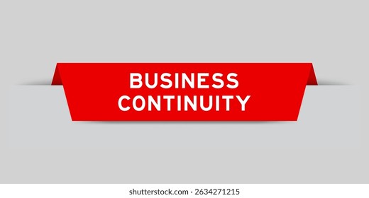 Red color inserted label with word business continuity on gray background