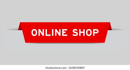 Red color inserted label with word online shop on gray background