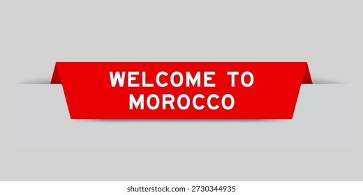 Etiqueta insertada de color rojo con la palabra bienvenida a Marruecos sobre fondo gris
