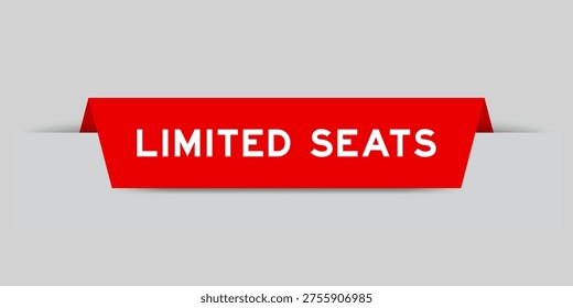 Red color inserted label with word limited seats on gray background