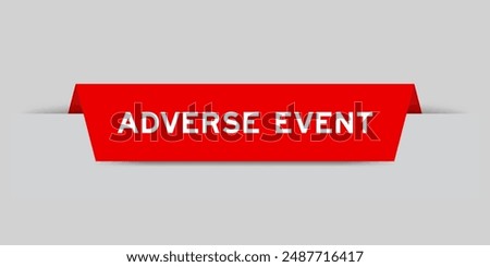 Red color inserted label with word adverse event on gray background