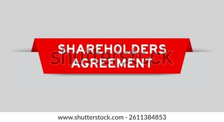 Red color inserted label with word shareholders agreement on gray background