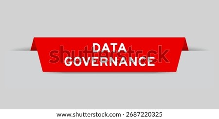 Red color inserted label with word data governance on gray background