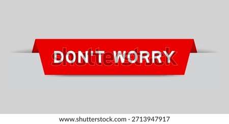 Red color inserted label with word do not worry on gray background