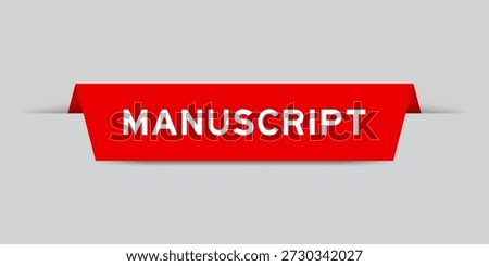Red color inserted label with word manuscript on gray background