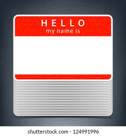 Red color name tag HELLO my name is. Pile blank stickers with drop gray shadow on gray background. Copy space for text. Vector illustration clip-art element for design saved in 10 eps