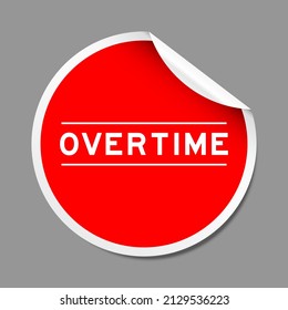 Red Color Peel Sticker Label With Word Overtime On Gray Background