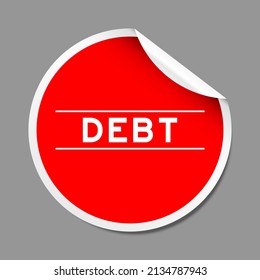 Red color peel sticker label with word debt on gray background