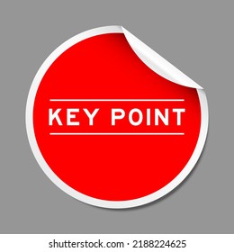Red color peel sticker label with word key point on gray background
