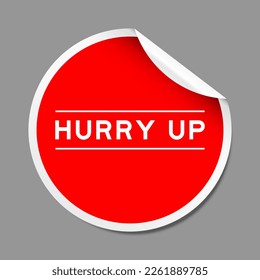 Red color peel sticker label with word hurry up on gray background