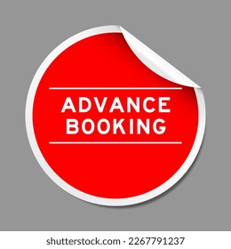 Red color peel sticker label with word advance booking on gray background