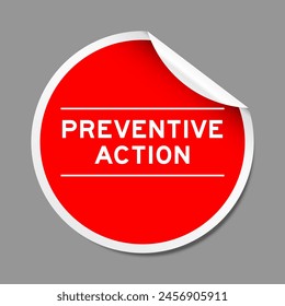 Red color peel sticker label with word preventive action on gray background