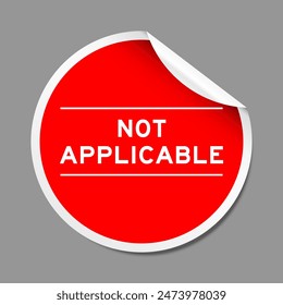 Red color peel sticker label with word not applicable on gray background