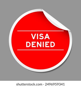 Red color peel sticker label with word visa denied on gray background