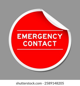 Red color peel sticker label with word emergency sticker on gray background