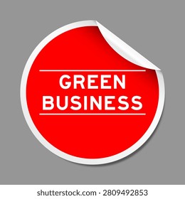 Red color peel sticker label with word green business on gray background