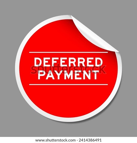 Red color peel sticker label with word deferred payment on gray background