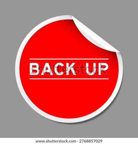 Red color peel sticker label with word back up on gray background