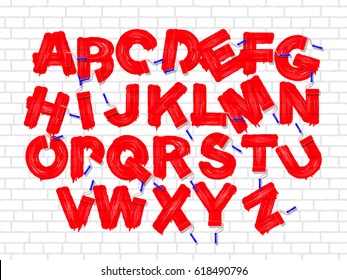 Red color roller brush graffiti alphabet on the old brick white wall background. Vector font set