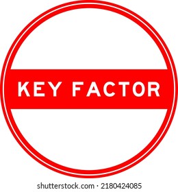 Red color round seal sticker in word key factor on white background