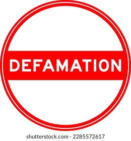 Red color round seal sticker in word defamation on white background