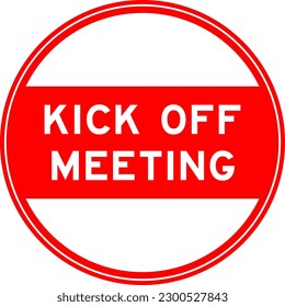 Red color round seal sticker in word kick off meeting on white background
