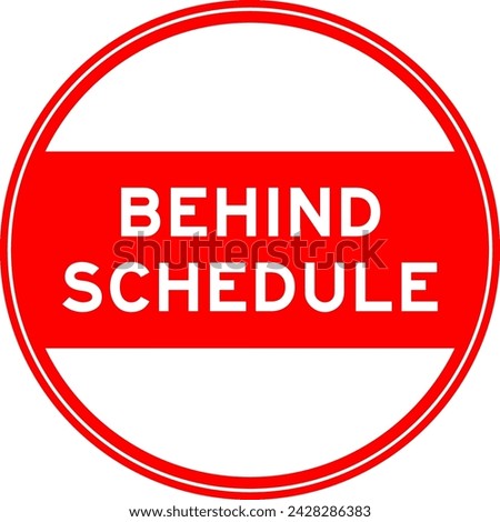 Red color round seal sticker in word behind schedule on white background