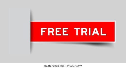 Red color square label sticker with word free trial that inserted in gray background