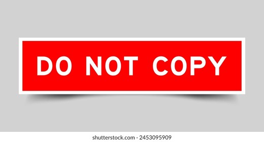 Red color square label sticker with word do not copy that inserted in gray background