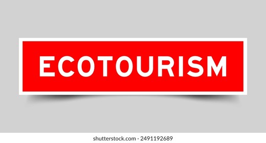 Red color square label sticker with word ecotourism that inserted in gray background