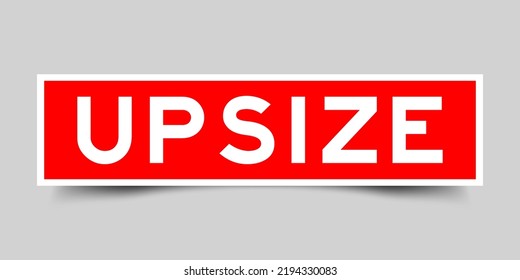 Red color square shape sticker label with word upsize on gray background