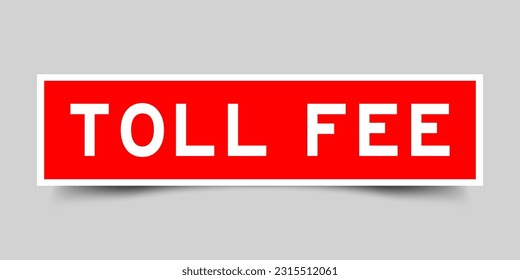 Red color square shape sticker label with word toll fee on gray background