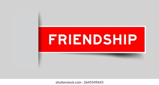 Red color square shape sticker label with word friendship inserted in gray background