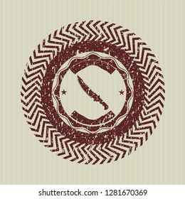 Red combat knife icon inside rubber stamp