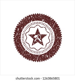 Red communism icon inside rubber texture