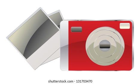 Red compact digital camera and photo cards on white background.