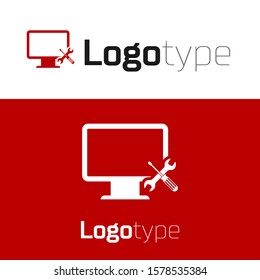 Red Computer monitor with screwdriver and wrench icon isolated on white background. Adjusting, service, setting, maintenance, repair, fixing. Logo design template element. Vector Illustration