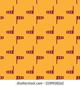 Red Cone meteorology windsock wind vane icon isolated seamless pattern on brown background. Windsock indicate the direction and strength of the wind.  Vector Illustration