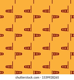 Red Cone meteorology windsock wind vane icon isolated seamless pattern on brown background. Windsock indicate the direction and strength of the wind.  Vector Illustration