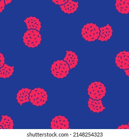 Red Cookie or biscuit with chocolate icon isolated seamless pattern on blue background.  Vector