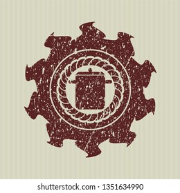 Red cooking pot icon inside distressed with rubber seal texture