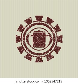 Red cooking pot icon inside rubber grunge stamp