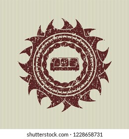 Red couch icon inside distress grunge style stamp