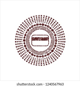 Red credit card icon inside rubber grunge texture stamp