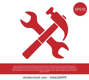 Red Crossed hammer and wrench icon isolated on white background. Hardware tools.  Vector Illustration