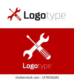 Red Crossed screwdriver and wrench tools icon isolated on white background. Service tool symbol. Logo design template element. Vector Illustration