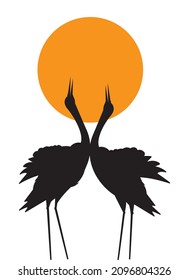 Rot gekrönte Kransilhouette einzeln auf weißem Hintergrund, Vektorgrafik. Zwei rote Kranvögel auf Sonnenuntergang, Abbildung. Kunstdesign