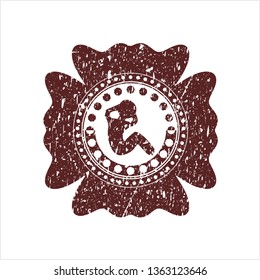Red crunch icon inside distress rubber seal