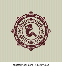 Red crunch icon inside distress rubber seal