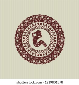 Red crunch icon inside distressed grunge style stamp